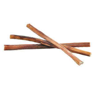 Three bully sticks in a pile on a white background