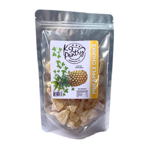 Package of pineapple chunks for dogs on a white background.