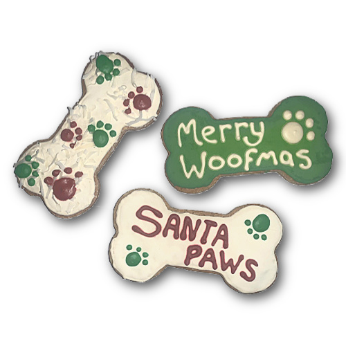 3 Jumbo decorated dog biscuits made from real peanuts with holiday designs in a yogurt based sugar free icing